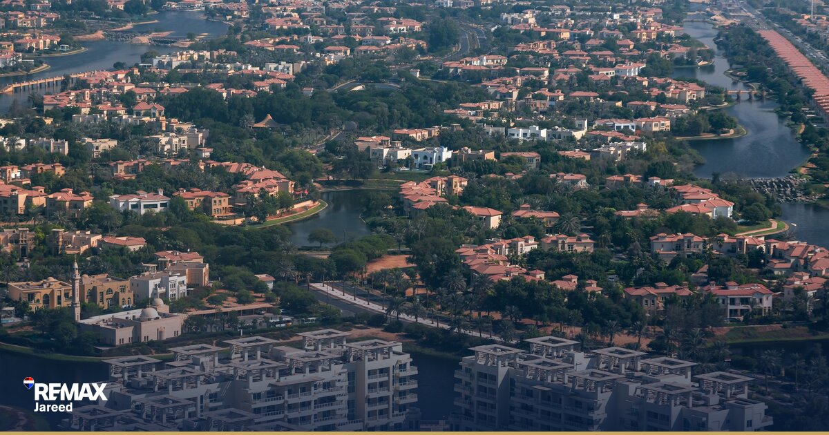 Residential construction site next to completed apartment buildings in West Cairo Egypt showing resale and off-plan development