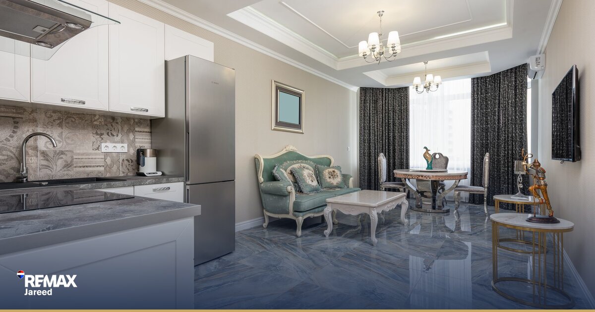 Bright, minimalist living room with neutral furniture, natural light, and clean surfaces ready for property viewings