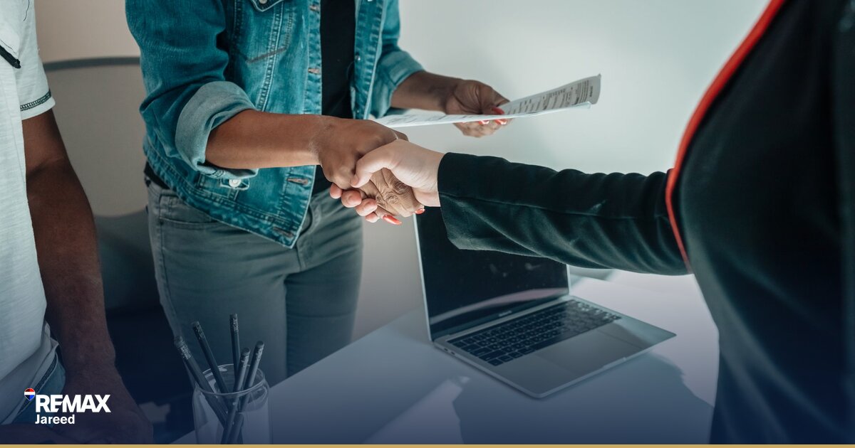 Real estate professional sending structured follow-up message after successful property viewing in modern office setting