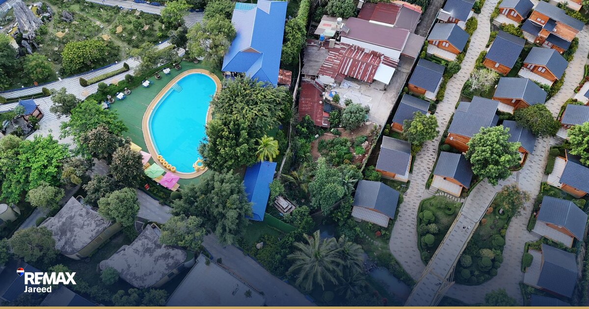 مجمع سكني حديث في الشيخ زايد بمساحات خضراء ومباني متعددة الطوابق